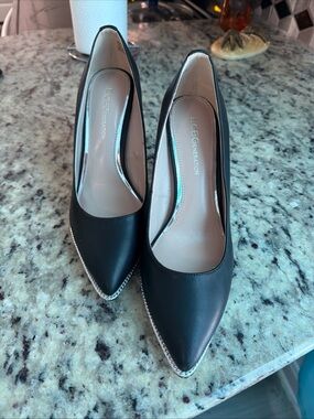 BCBGeneration Black Pointed Toe Pumps with Silver Trim